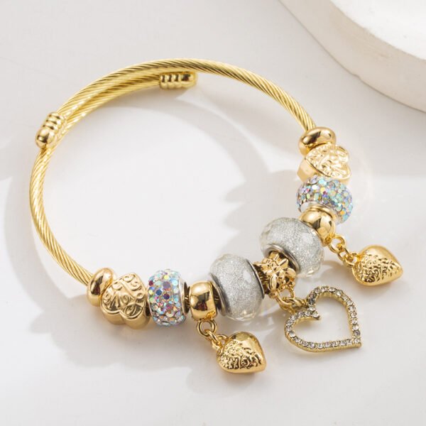 New stainless steel bracelet with diamond and crystal setting, love pendant, adjustable opening.